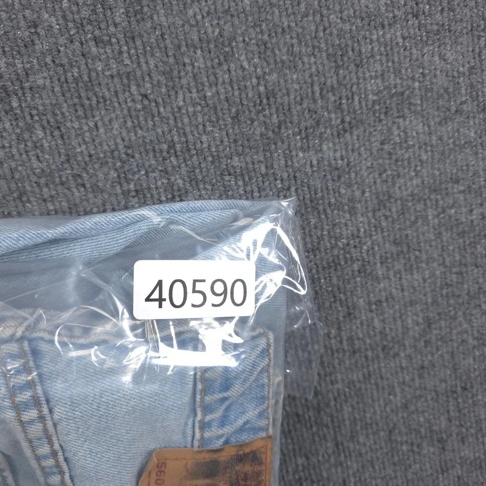 VINTAGE Levis 560 Loose Fit Tapered Leg Jeans Light Wash Blue Mens Denim 34x32